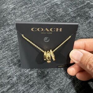 Coach Signature Rondell Gold Charm Necklace